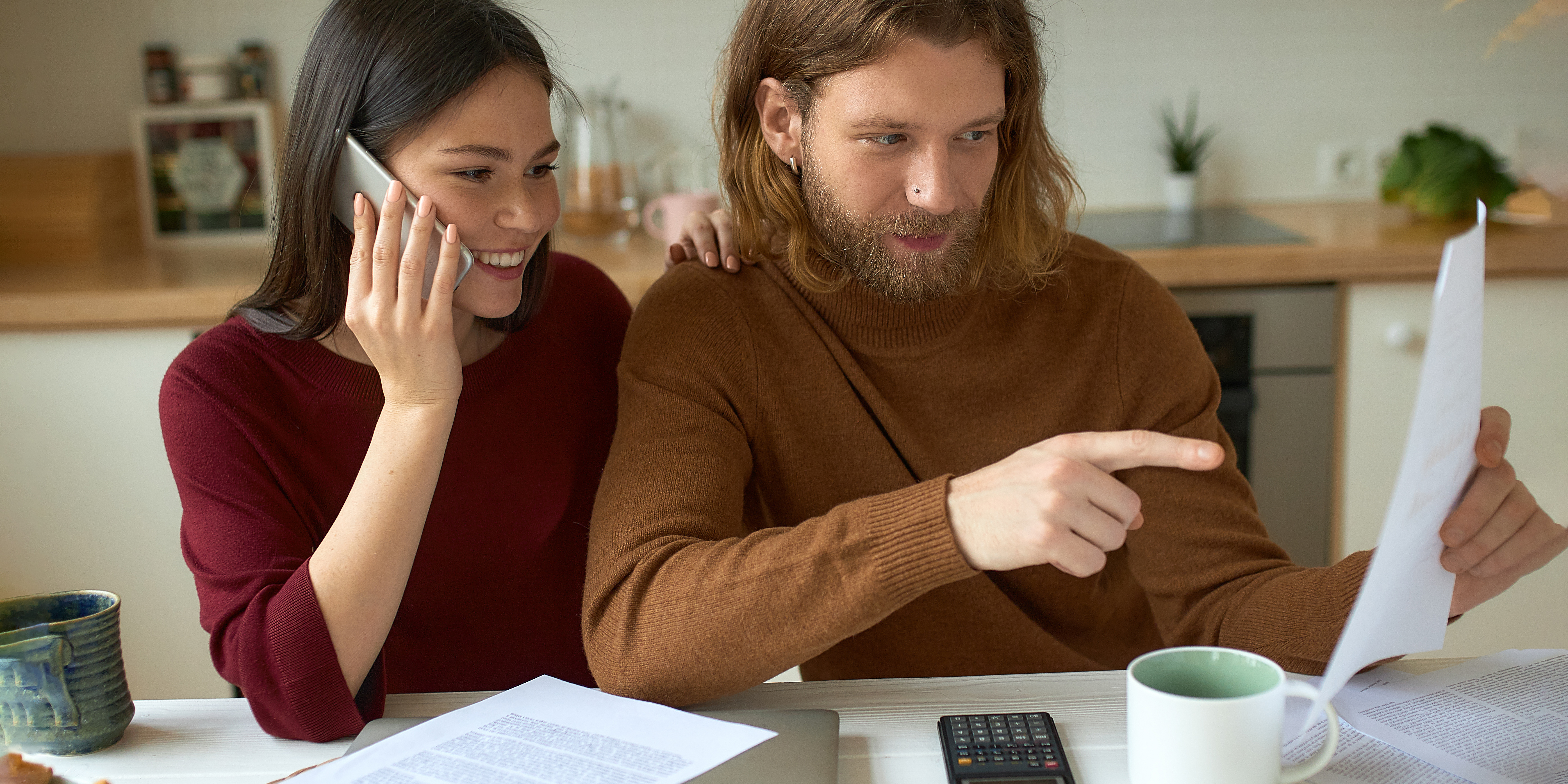 A couple looking at costs